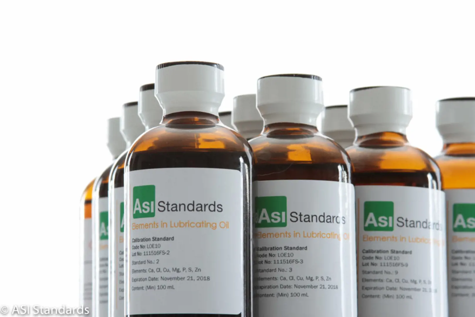 bottles containing element in oil reference standards from ASI Standards